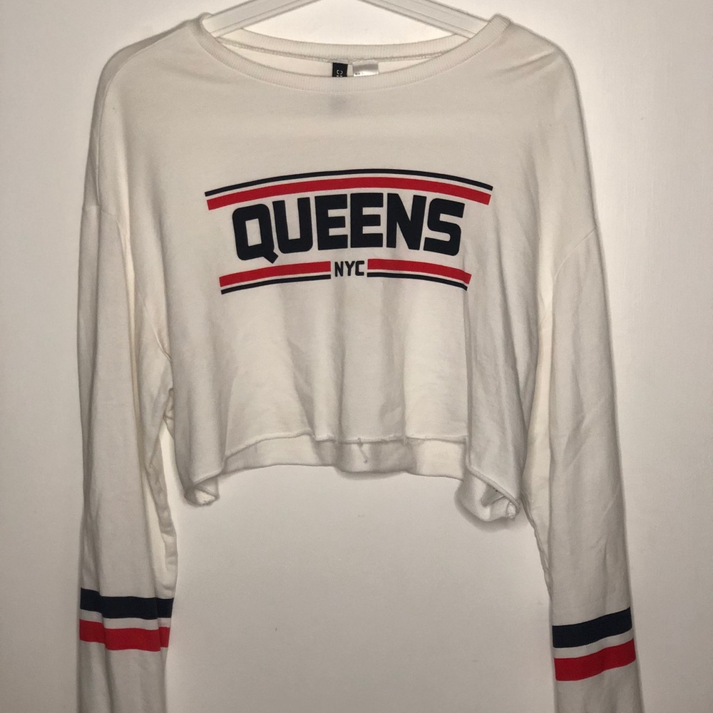 •A cropped sweater•